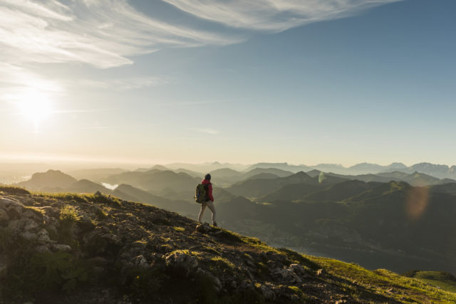 Hiker walking alone in the mountains