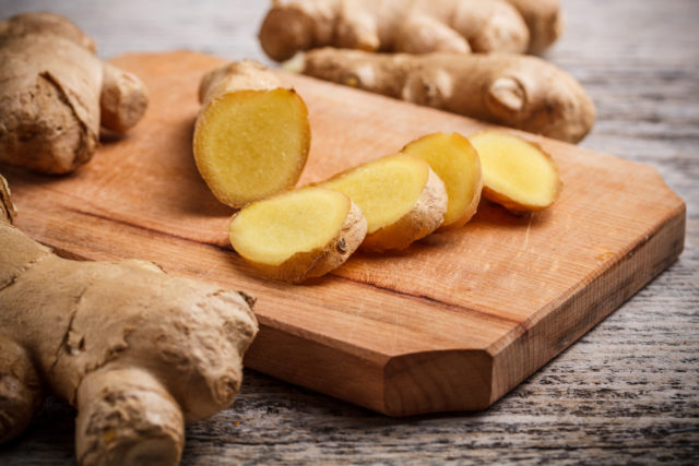 Ginger root on a wood cutting board